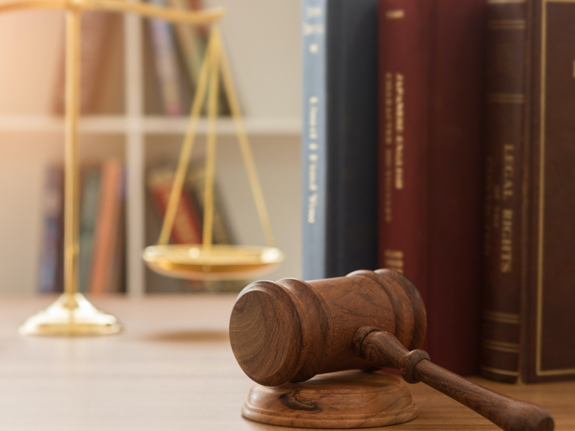 law books gavel and weights and scales