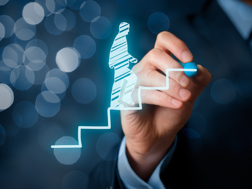 person digitally drawing figure climbing steps