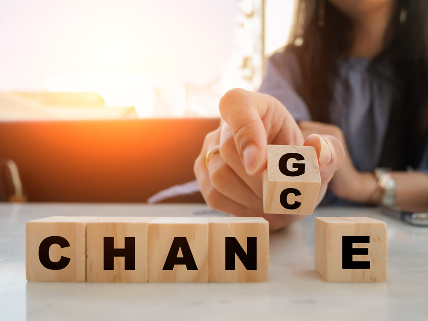 woman changing blocks from change to chance