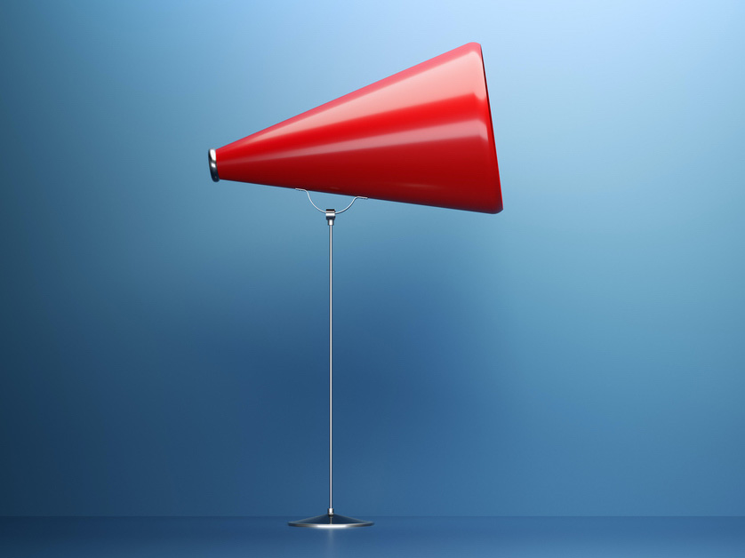 red megaphone on a blue background