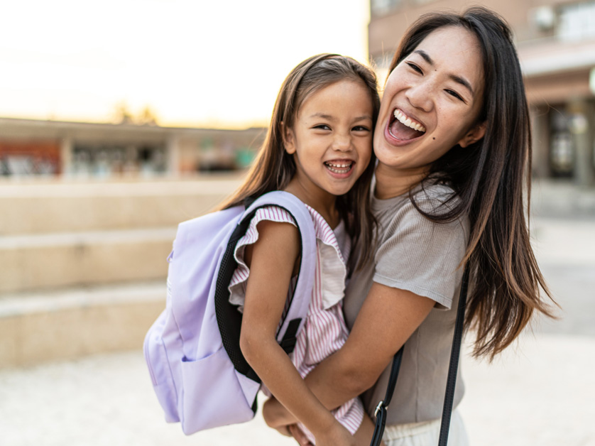 girl and mother back to school