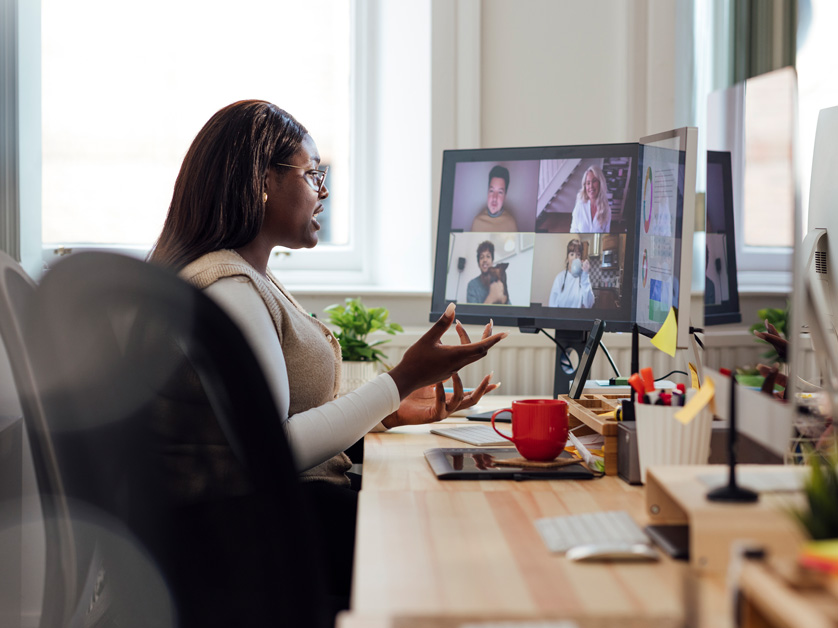woman video conferencing from home