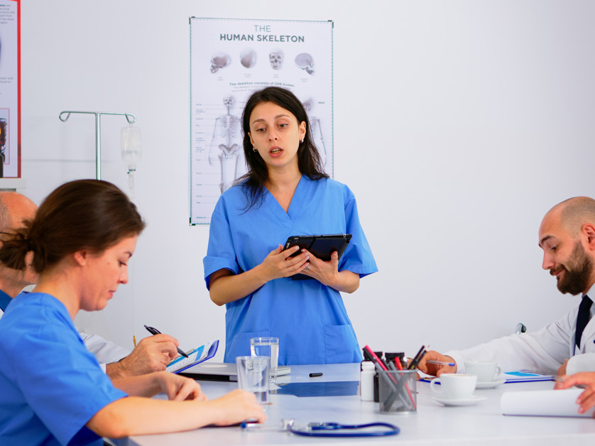 nurses and medical team in boardroom