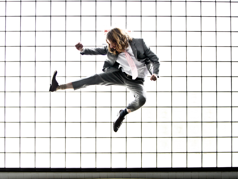 business man doing ninja moves